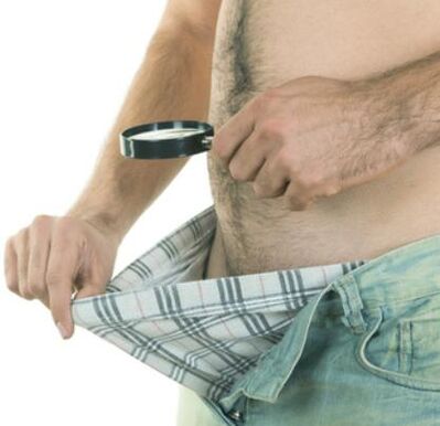 A man checks his penis and wants to enlarge it
